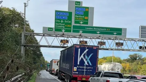 M25 Dartford Crossing closed as protesters climb bridge