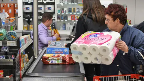 Getty Images Supermarket workers