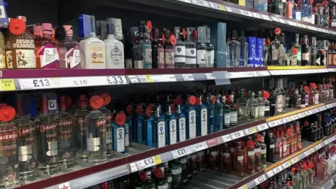 Getty Images Alcohol on supermarket shelf