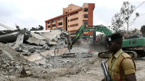AFP A building on a riparian reserve is demolished in Nairobi
