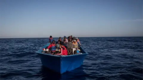 Getty Images Migrants on a boat