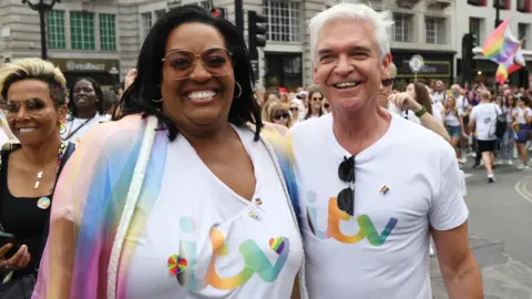 Getty Images Alison Hammond and Phillip Schofield attend Pride in London 2022: The 50th Anniversary - Parade on July 02, 2022 in London, England