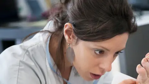 Getty Images A health worker applying a dressing