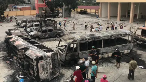 AFP/Getty Burnt buses in central Binh Thuan province, Vietnam June 2018