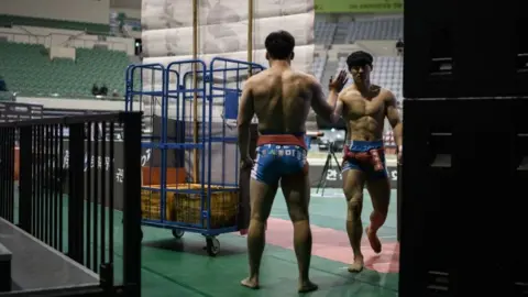 AFP/Getty Korean wrestlers