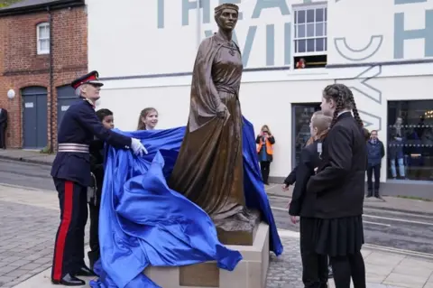 PA/Andrew Matthews Statue unveiling