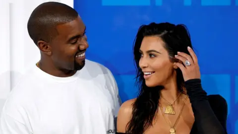 Reuters Kanye West and Kim Kardashian