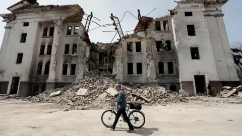 Reuters A view shows a destroyed theatre building in Mariupol