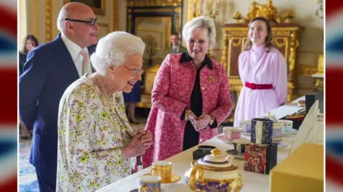 Halcyon Days The Queen looks at chinaware