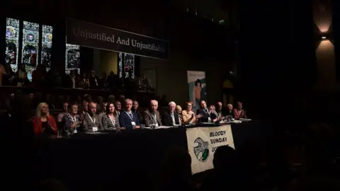 PA Families of those who were killed held a press conference inside the Guildhall in Derry after the announcement that Soldier F was to be charged with murder.