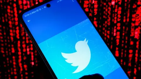 Getty Images Twitter logo displayed on smartphone screen