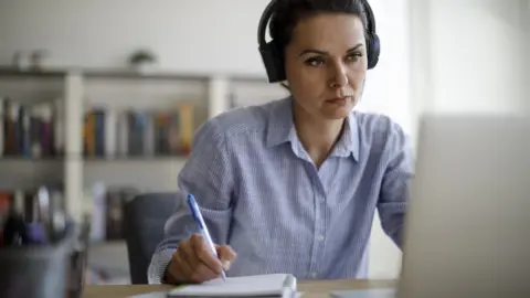 Getty Images Woman using her laptop
