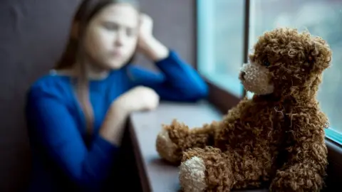 Getty Images A child and her teddy bear