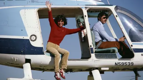 Getty Images Kitty O'Neil with unnamed helicopter pilot