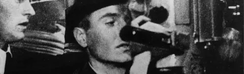 Hulton Archive/Getty Aboard a German U-boat a seaman is learning how to use the periscope, circa 1941