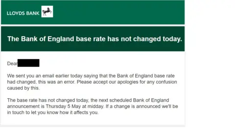 An email apologising to Lloyds Bank customers for an error sent by the bank, saying that the Bank of England base rate had changed.