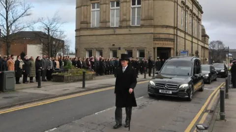 Lancashire Police A guard of honour ahead of Peter Lawson's funeral