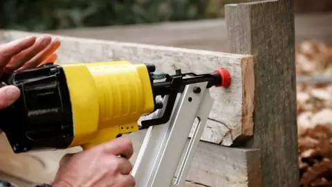 Getty Images Nail gun