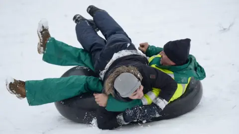 Wales News Service Two men on a tube