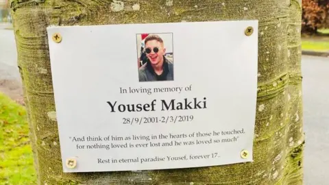 Family photo Memorial plaque in honour of Yousef Makki