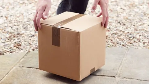 Getty Images Stock image of a box being delivered