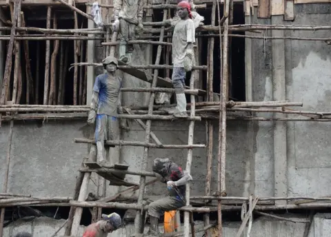 Reuters Men work in a construction site in Goma, the capital of North Kivu, eastern Democratic Republic of Congo, April 4, 2018