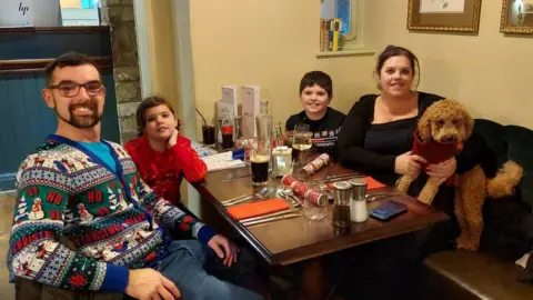 Marie-Claire O'Connor Jamie and Marie-Claire O'Connor, their two children, and their dog