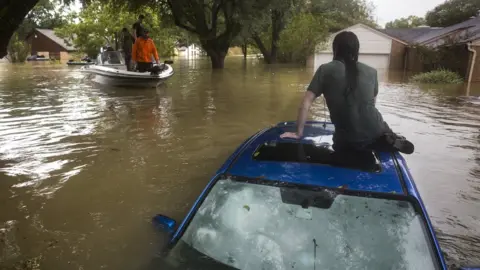Getty Images Being rescues from the Bear Creek neighbourhood