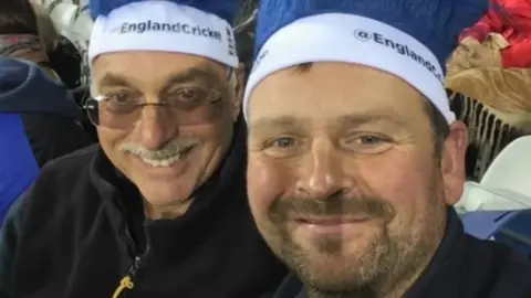 Family photograph Danny and Bill at the cricket