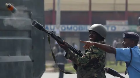 Reuters Anti-riot police fire tear gas to disperse opposition supporters of Kenyan in Nairobi, Kenya on 17 November 2017
