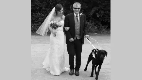 Joanne Stone Jon Petty with his guide dog