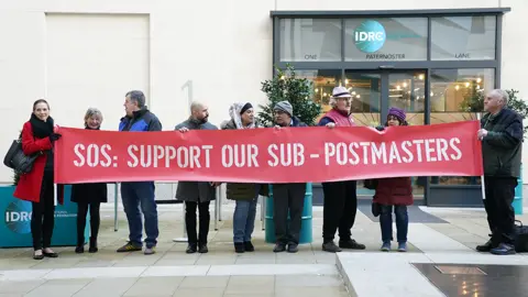 PA Media Protestors outside the Post Office Horizon IT inquiry at the International Dispute Resolution Centre, London, ahead of the one-day hearing on issues relating to compensation on 8 December2022