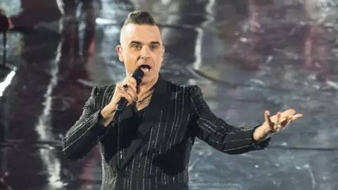 Getty Images Robbie Williams