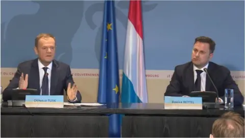 PA Donald Tusk (left) and Xavier Bettel