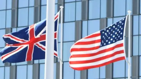 Getty Images Union Jack and US flags