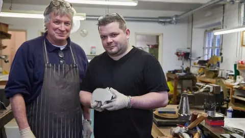 PA Media Bristol Silversmiths Philip Kydd (left) and his son James