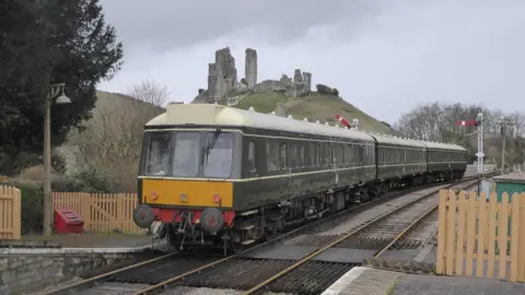 Robin in Wessex A diesel train at Corfe Castle station on the Swanage Steam Railway