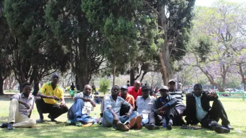 Kumbirai Mafunda Itai and other protesters