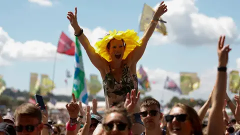 A woman in the crowd at Glastonbury Festival