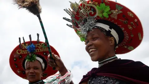 Rogan Ward/Reuters Performers arrive ahead of the Ingoma yase eMaChuwini annual dance competition held in eMaChuwini, Msinga, South Africa - Friday 29 December 2023