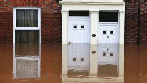 REUTERS/Andrew Yates Doors flooded