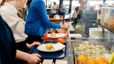Getty Images Children being served in a school canteen