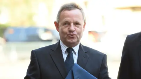 PA Andy Hill arriving at court