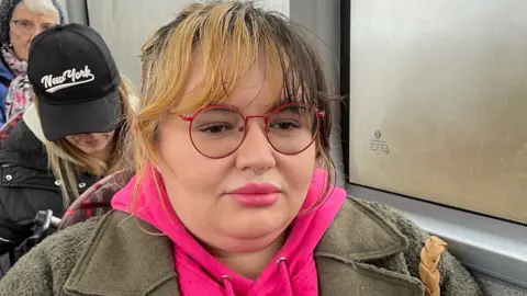 Shaun Whitmore Passenger Rosie Rush on the X55 bus