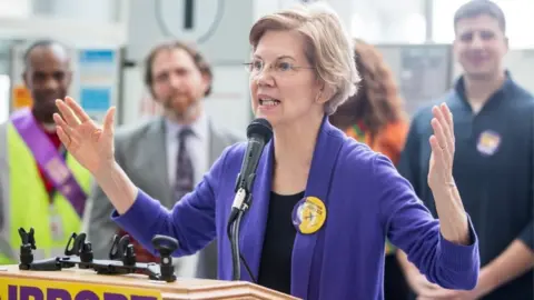 Getty Images Senator Warren speaks at a rally