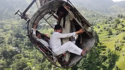 People inside cable car