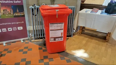 Red amnesty bin at Christ Church, Old Town