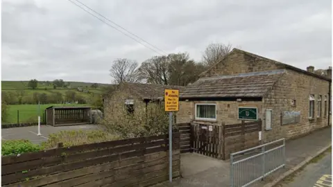 A photo of the outside of Fountains Earth CE Primary School