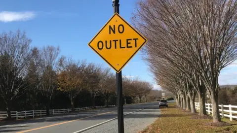 A road sign that says: "No Outlet"