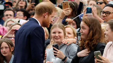 Getty Images Harry meeting fan India Brown in Melbourne, who later burst into tears